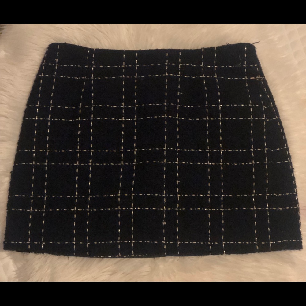 Tweed mini skirt.